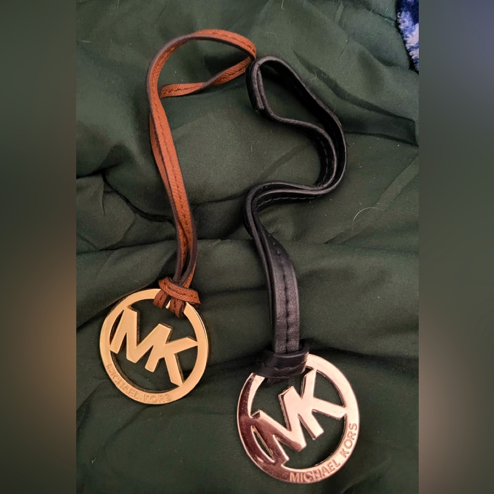 Two (2) Michael Kors purse lariats